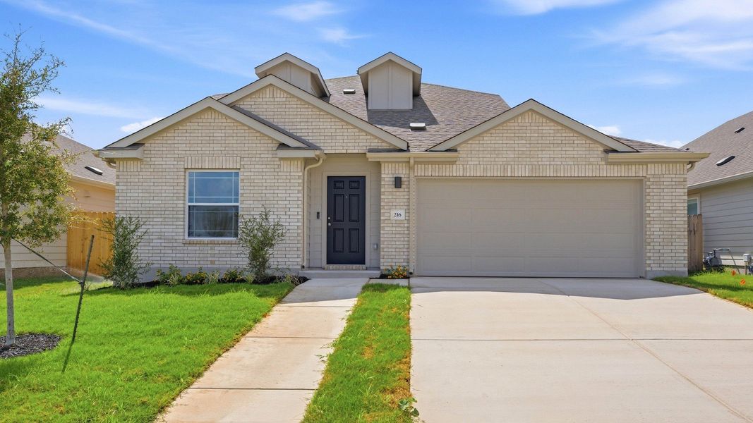 Front exterior of a new home in Sky Ridge, San Marcos, TX, highlighting curb appeal (Image 2). Front exterior of a new home in Sky Ridge, San Marcos, TX, highlighting curb appeal (Image 2).