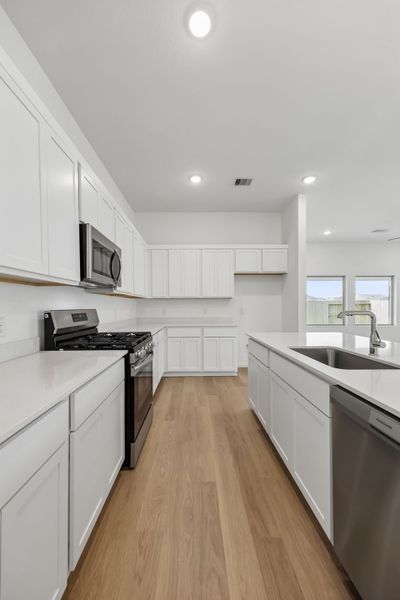 Furnished interior view inside a new home in Riviera Pines, Huffman (Image 10).