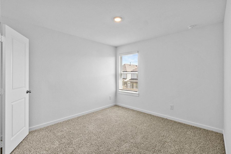 Spacious, unfurnished interior of a new home in Grand West, Houston (Image 21).