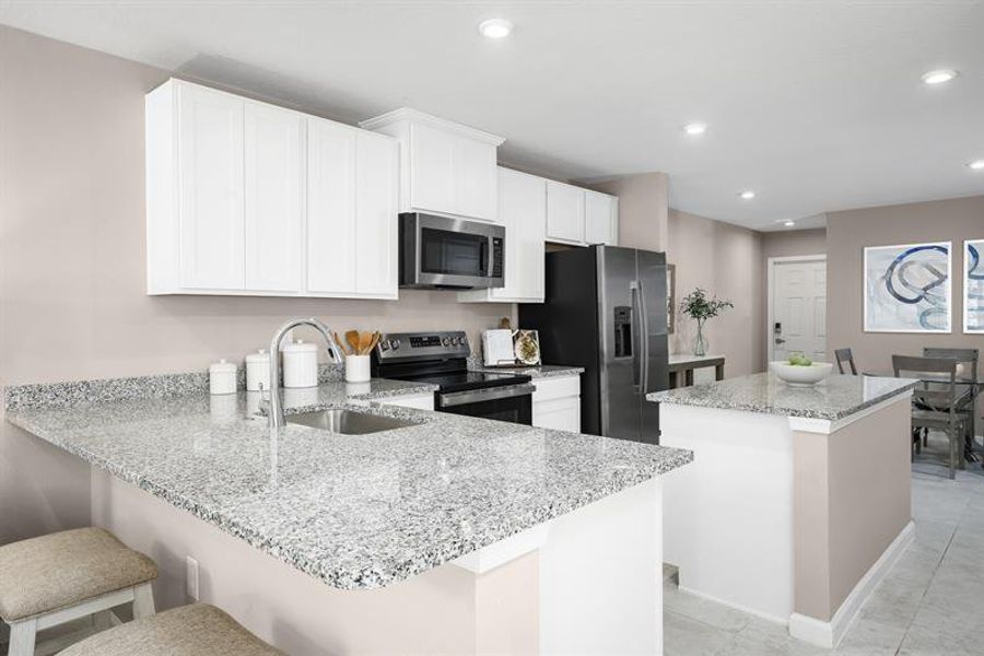 Representative furnished interior of a home built from the Flamingo Ww by Ryan Homes in Kirkwood Grove, Jacksonville (Image 5).