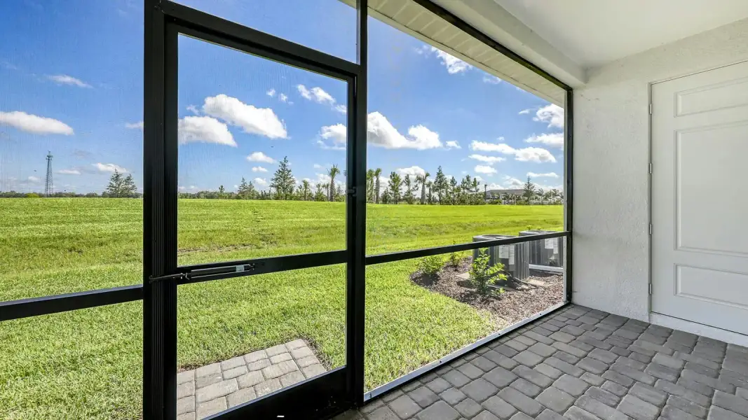Exterior details and patio area of a home in Palm Grove Real Estate and Homes for Sale in Lakewood Ranch, FL - Neal Communities, Lakewood Ranch (Image 31).