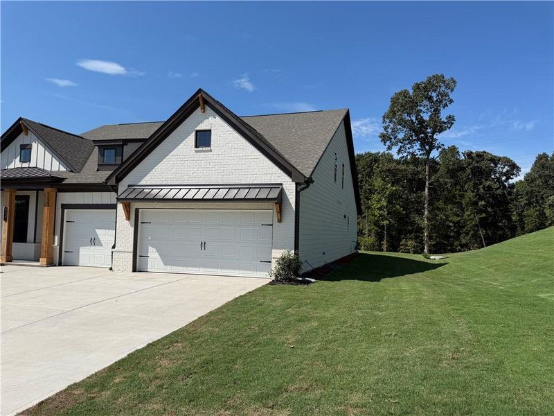 Front exterior of a new home in Mallard’s Landing, Jefferson, GA, highlighting curb appeal (Image 15).