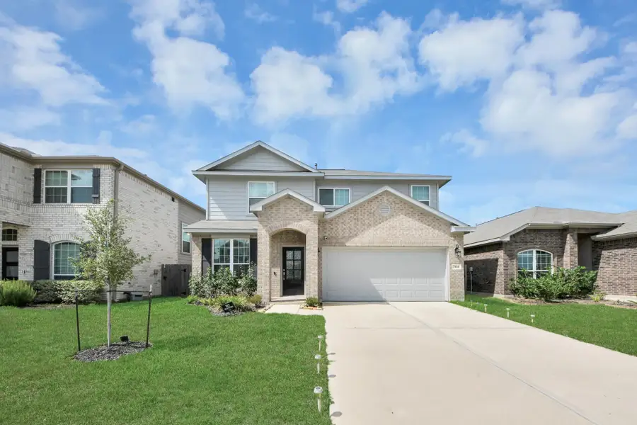 Front exterior of a new home in Willow Trace, Spring, TX, highlighting curb appeal (Image 28).