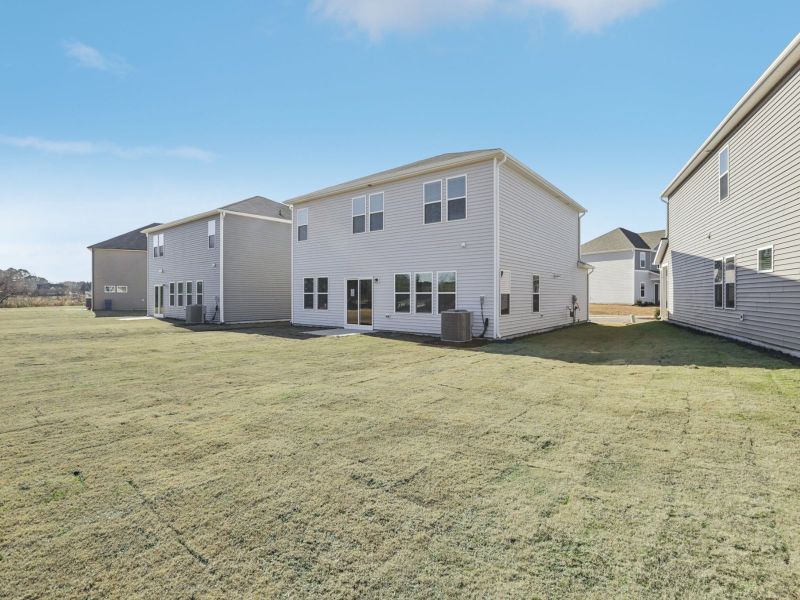 Backyard in the Dakota floorplan at 199 White Birch Lane.