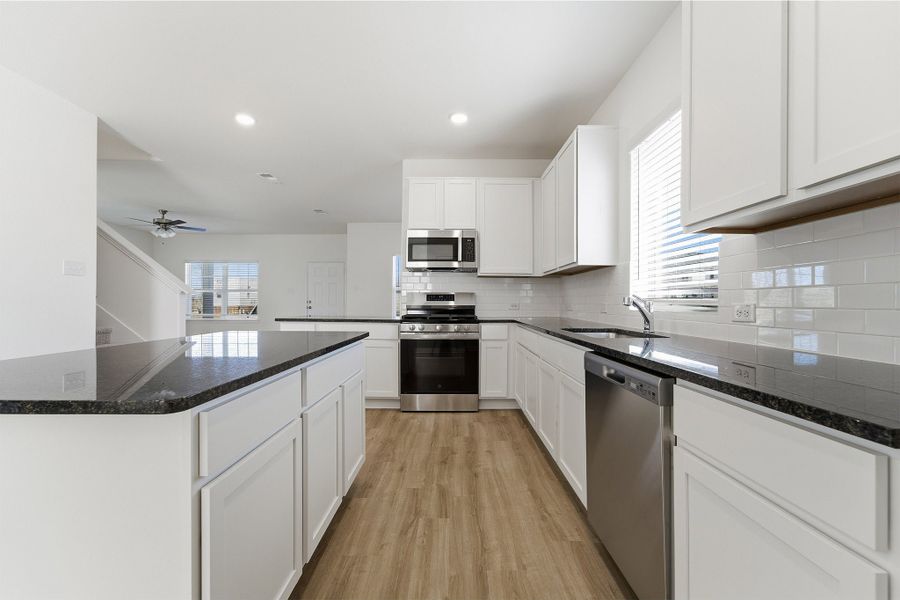 Furnished interior view inside a new home in La Terra, Celina (Image 6).