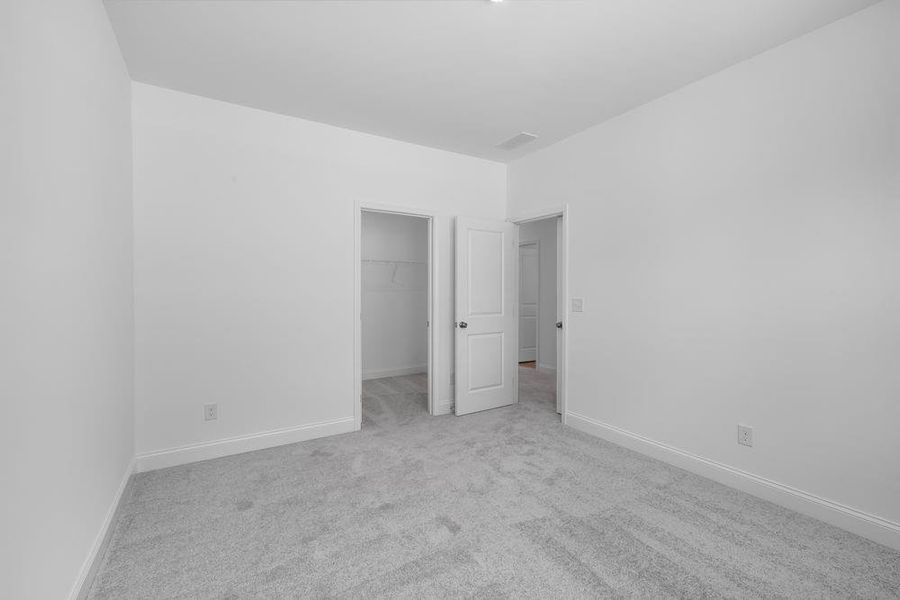 Spacious, unfurnished interior of a new home in Bennett Farm, Loganville (Image 24).