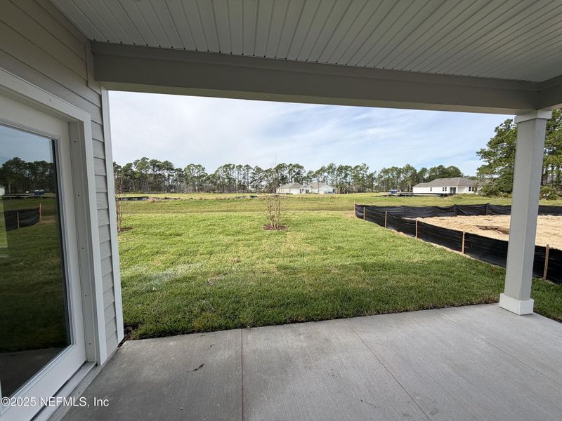 Exterior details and patio area of a home in , Flagler Beach (Image 3).
