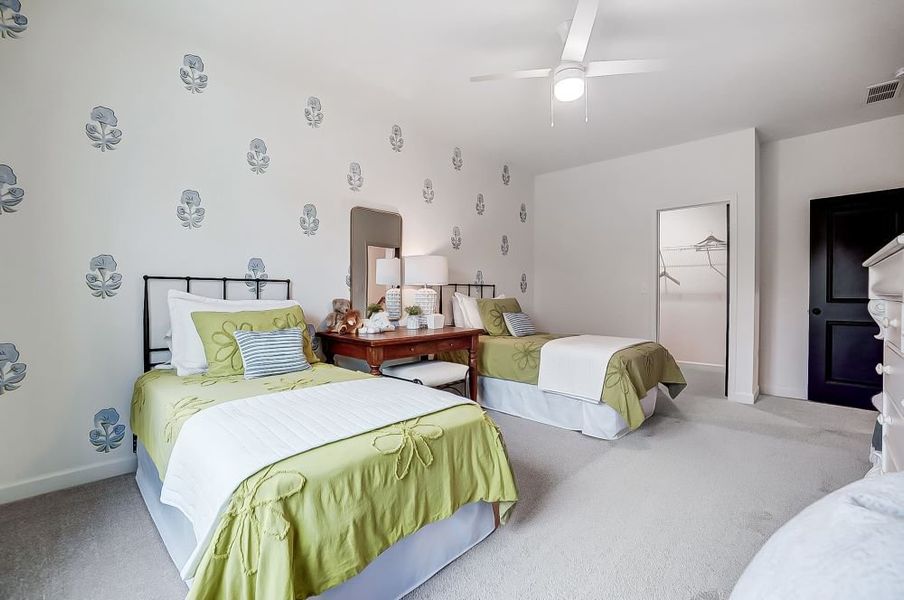 2 story home with a first floor main bedroom