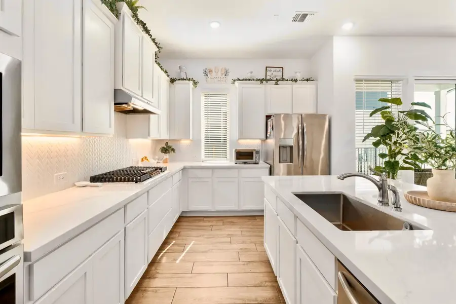 Natural light covering the kitchen as well.