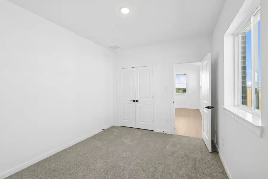 Spacious, unfurnished interior of a new home in The Grand Prairie 50’, Hockley (Image 10).