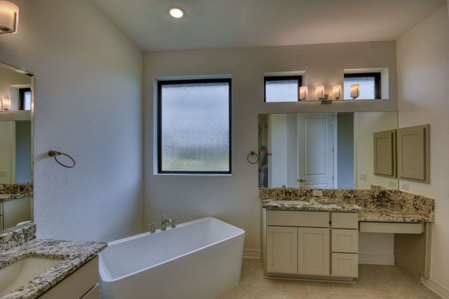 Furnished interior view inside a new home in El Sonido at Campanas, San Antonio (Image 11).