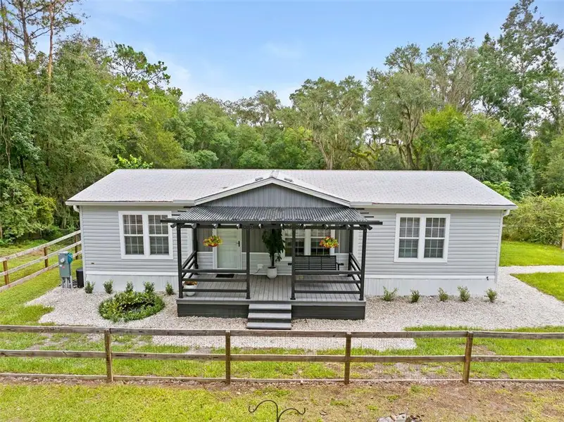 Exterior details and patio area of a home in , Brooksville (Image 26).