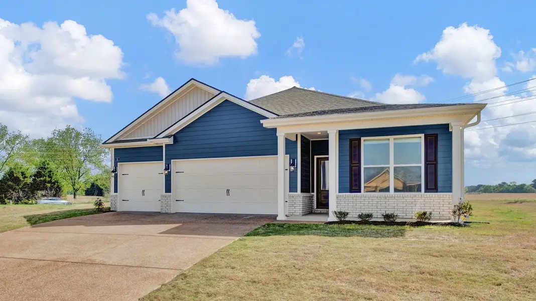Front exterior of a new home in Riverwood Gardens, Oakland, TN, highlighting curb appeal (Image 2).