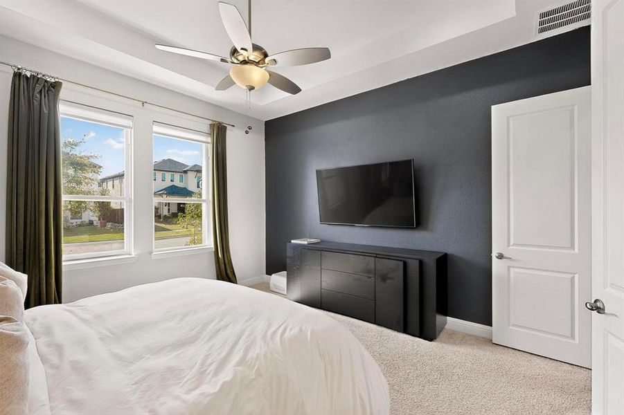 Bedroom with carpet and ceiling fan Bedroom with carpet and ceiling fan