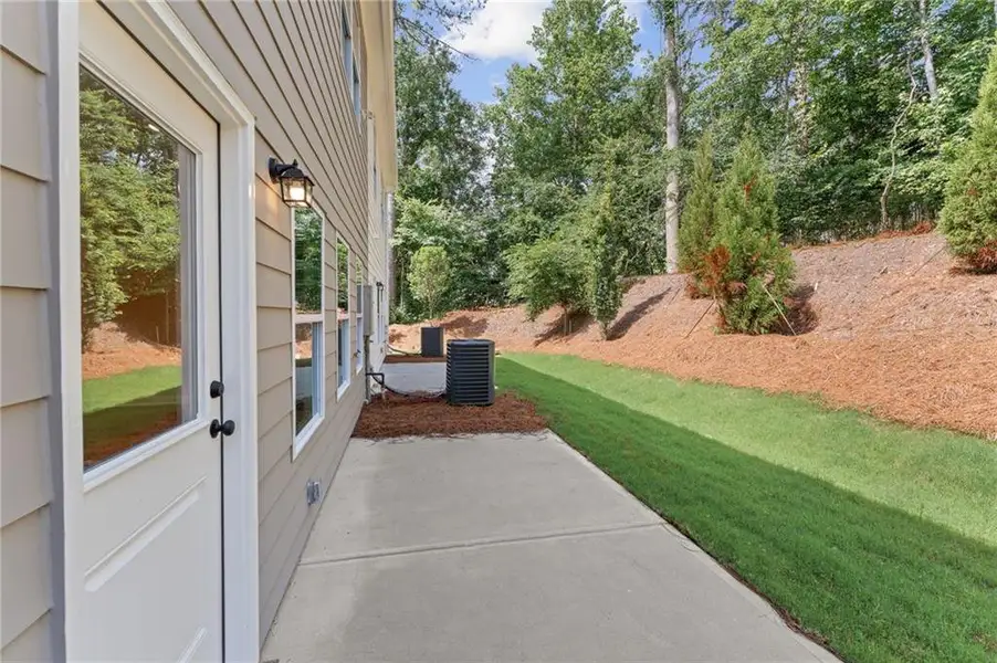 Exterior details and patio area of a home in Cherokee Township, Acworth (Image 4).
