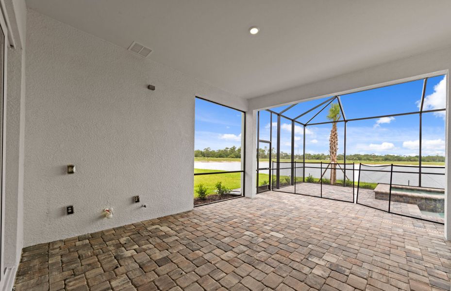 Exterior details and patio area of a home in Del Webb Oak Creek, North Fort Myers (Image 3).