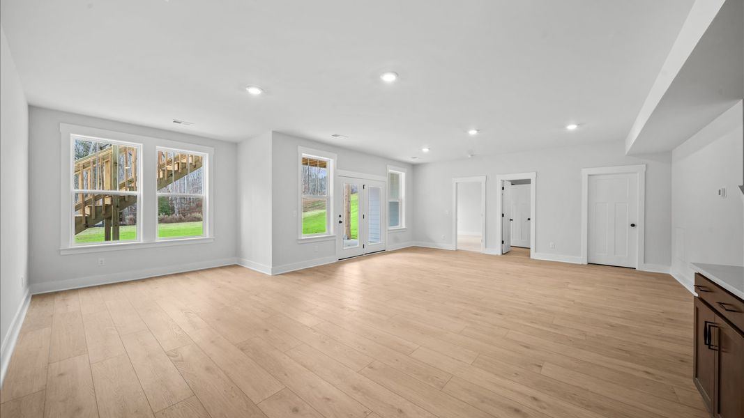 From storage to hosting, this hardwood-finished basement is designed for real-life living