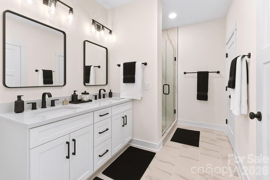 Three and a half Baths. Main Bath suite with dual vanities & tiled Shower. Three and a half Baths. Main Bath suite with dual vanities & tiled Shower.