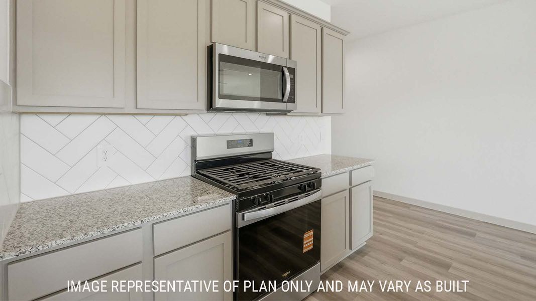 Furnished interior view inside a new home in Reserve at Mallard Lakes, Orange (Image 6).