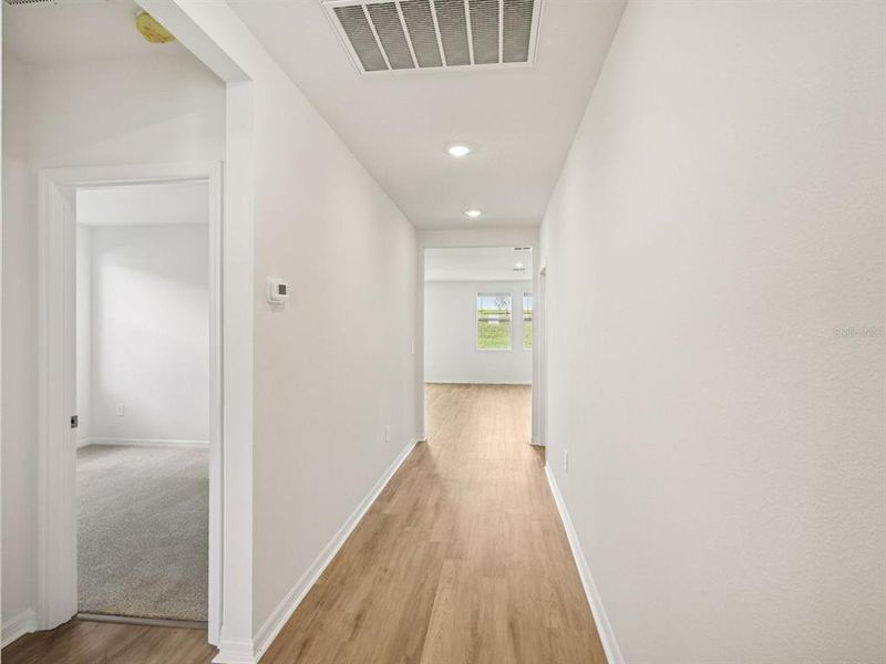 Spacious, unfurnished interior of a new home in The Reserve at Van Oaks, Auburndale (Image 21).