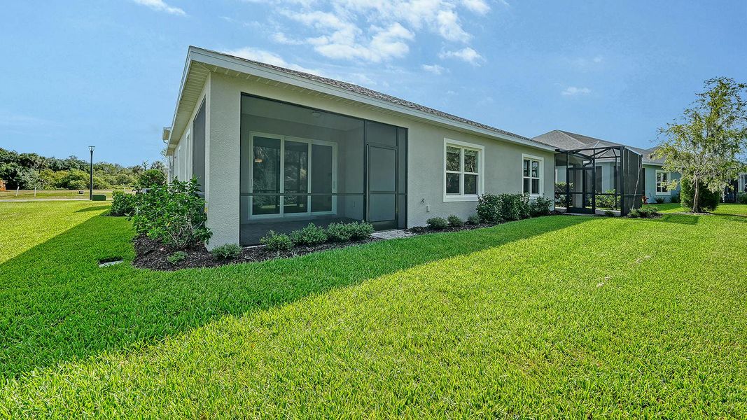 Exterior details and patio area of a home in Wildleaf Real Estate and Homes for Sale in Parrish, FL - Neal Communities, Parrish (Image 23).