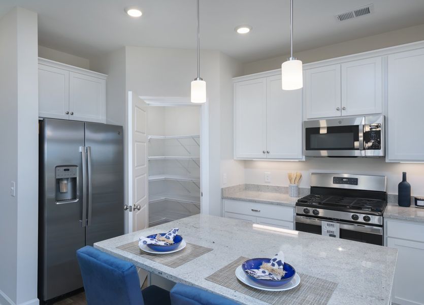 Representative furnished interior of a home built from the The Kennedy by Cothran Homes in Holly Ridge, Greenville (Image 16).