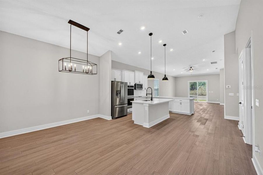 Furnished interior view inside a new home in Stables at Cary Forest, Bryceville (Image 6).