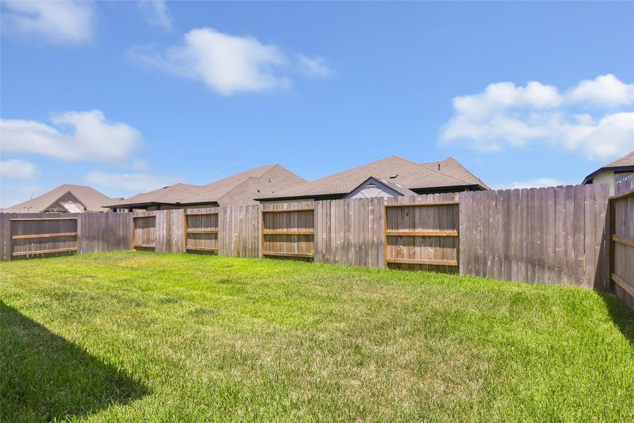 Exterior details and patio area of a home in Grand Central Park, Conroe (Image 2).