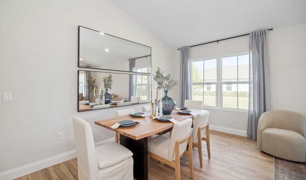 Dining area with vaulted ceiling