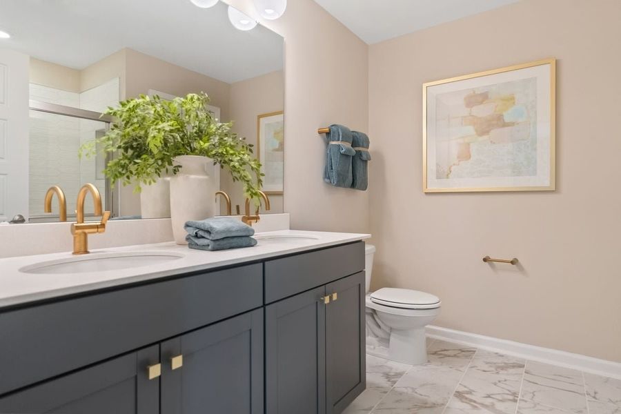 Dual-sink vanity at primary bath