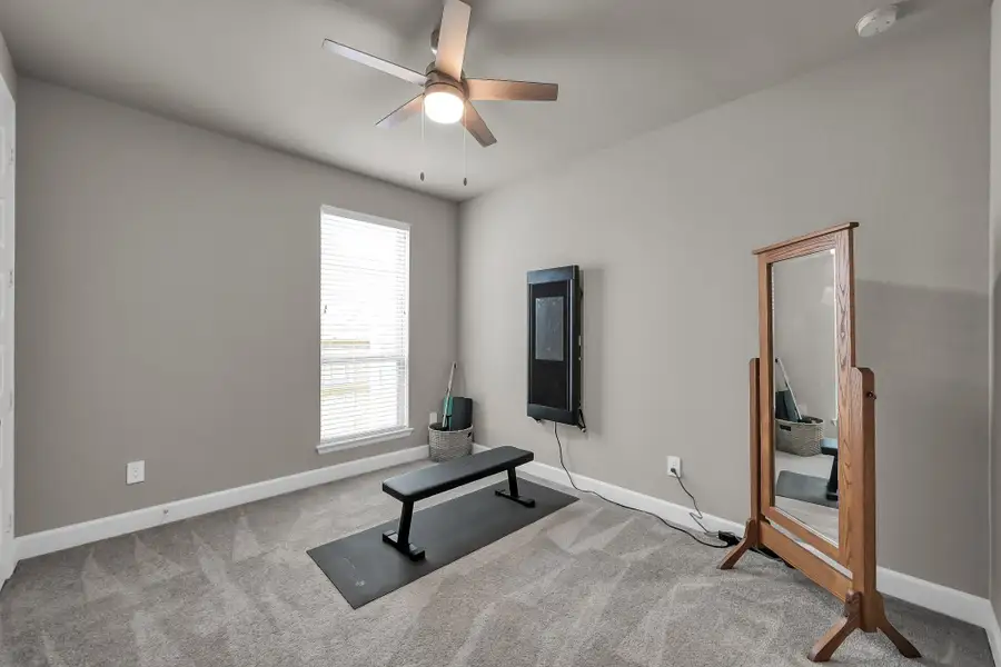 Furnished interior view inside a new home in Grand Central Park 45', Conroe (Image 5).