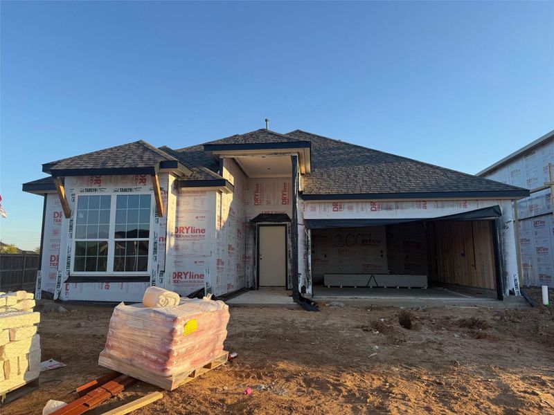 Exterior details and patio area of a home in Bluestem, Brookshire (Image 2).