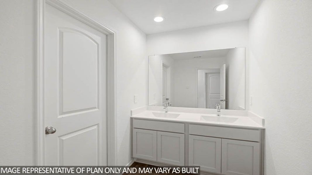 Furnished interior view inside a new home in Sunterra, Katy (Image 7).