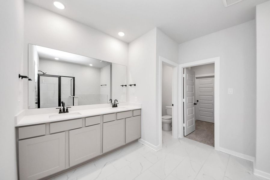 Furnished interior view inside a new home in Enclave at Newport, Crosby (Image 6).