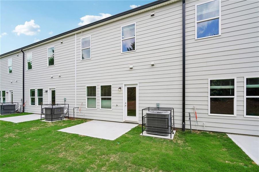 Exterior details and patio area of a home in Artisan Walk, Fairburn (Image 23).