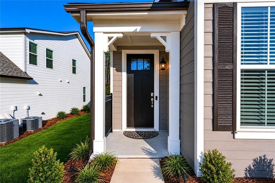 Exterior details and patio area of a home in , Hoschton (Image 31).