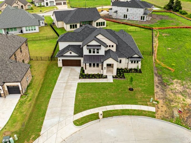 Front exterior of a new home in Heath Golf and Yacht Club, Heath, TX, highlighting curb appeal (Image 37).