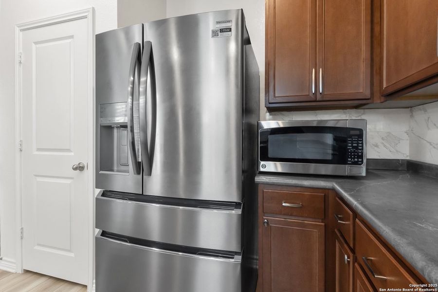 Close-up of interior finishes inside a home in Cove at Westover Hills, San Antonio (Image 14).
