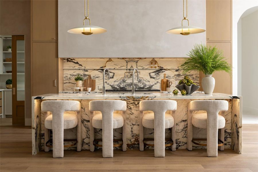 Appliances include a Wolf 60” gas range with 6 burners and double griddle and a 72” Sub-Zero built-in refrigerator/freezer. Appliances include a Wolf 60” gas range with 6 burners and double griddle and a 72” Sub-Zero built-in refrigerator/freezer.