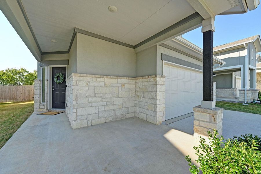 Exterior details and patio area of a home in Porter Country, Buda (Image 20).
