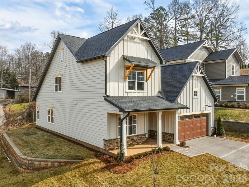 Front exterior of a new home in , Weaverville, NC, highlighting curb appeal (Image 25).