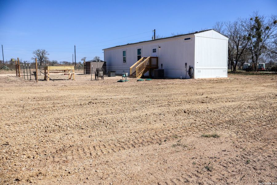 Exterior details and patio area of a home in , La Vernia (Image 17).