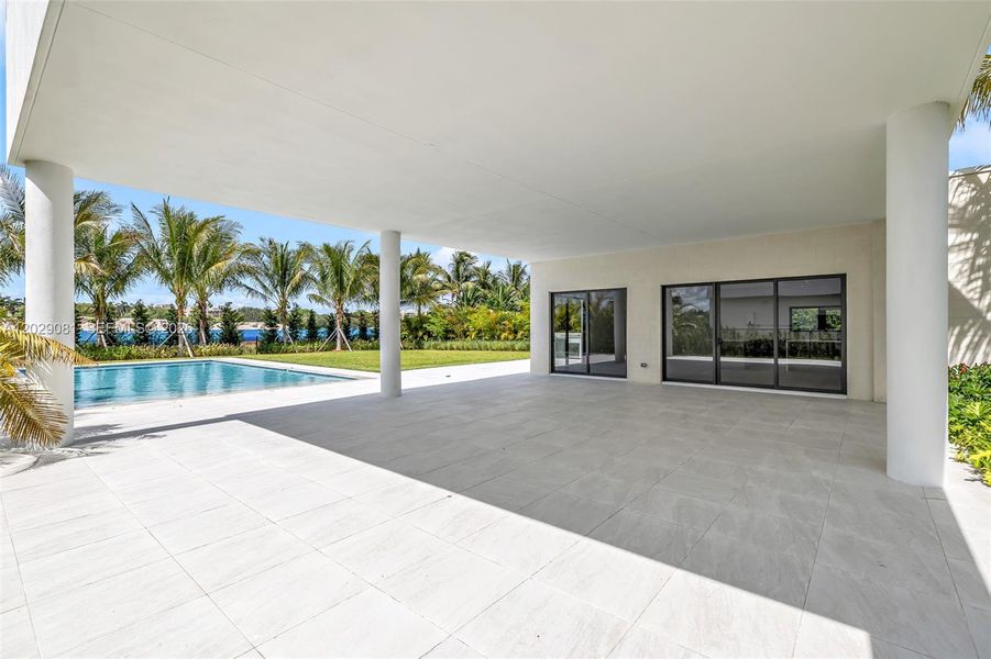 Exterior details and patio area of a home in , Weston (Image 28).