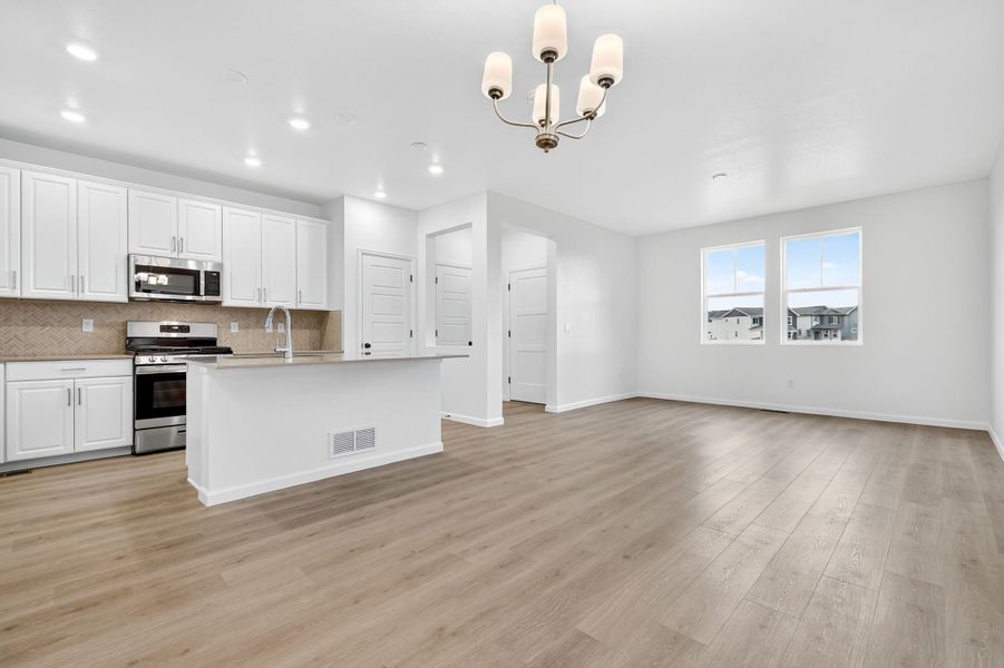 Spacious, unfurnished interior of a new home in Parterre Horizon Collection, Thornton (Image 8).