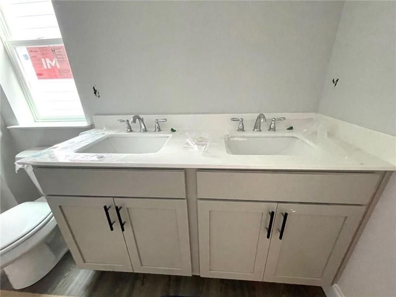 Furnished interior view inside a new home in The Village at Towne Lake, Woodstock (Image 51).