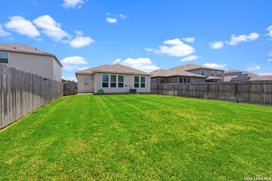 Exterior details and patio area of a home in Briarwood Oaks, San Antonio (Image 3).