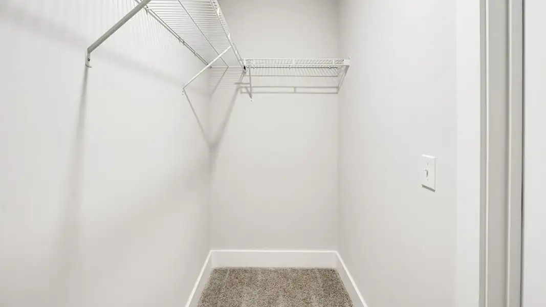 Spacious, unfurnished interior of a new home in The Cove at Indigo Preserve Townhomes, Leland (Image 14).