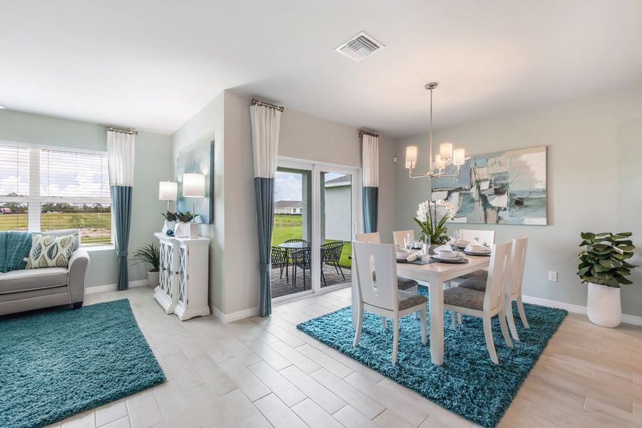 Representative furnished interior of a home built from the Cali by D.R. Horton in Coral Bay - Express & Tradition, North Fort Myers (Image 9).