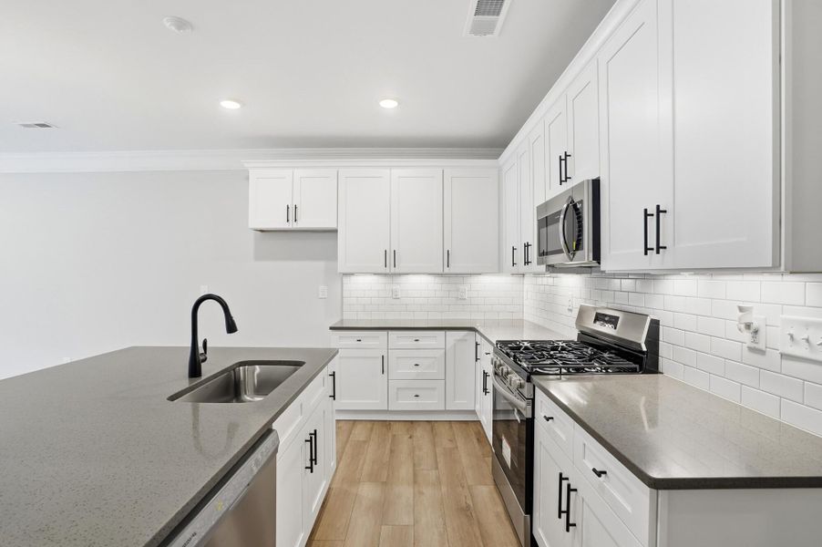 Furnished interior view inside a new home in Harrisburg Village Townhomes, Harrisburg (Image 8).