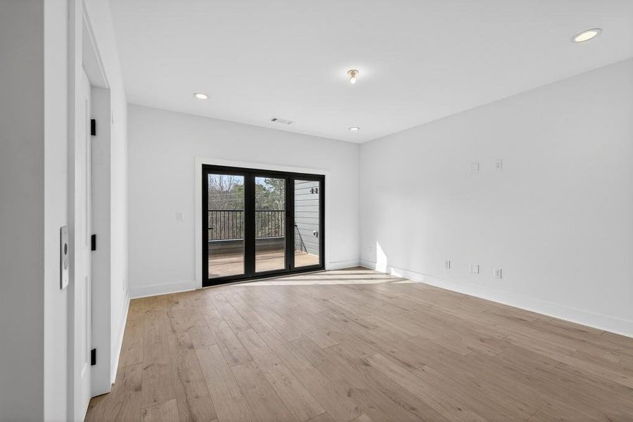 Spacious, unfurnished interior of a new home in Skyview On Broad, Sugar Hill (Image 28). Spacious, unfurnished interior of a new home in Skyview On Broad, Sugar Hill (Image 28).